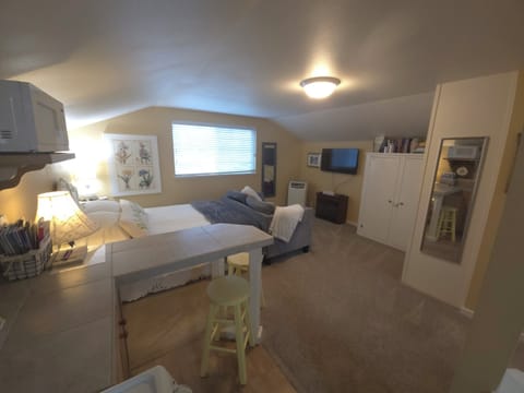 Bedroom, living room area. Flat screen TV, fireplace heater, AC, Closets, View.