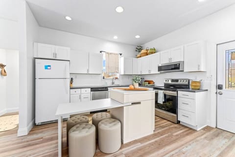 Modern kitchen with all the essentials for a comfortable stay. Perfect for cooking and relaxing.