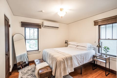The bedroom is a cozy sanctuary, designed for rest and relaxation. With a comfortable bed and thoughtfully chosen furnishings, it offers a peaceful retreat for a restful night's sleep.