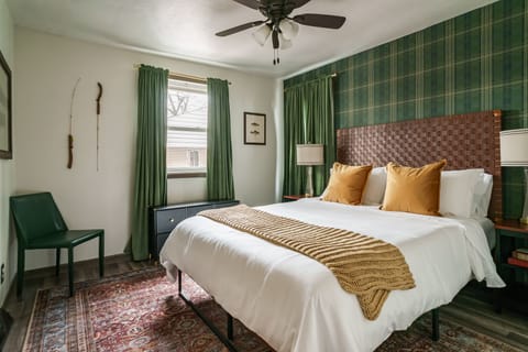 Old School Glam Bedroom 1 with ceiling fan, and elegant dresser