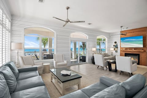 The Living Room features tons of comfortable seating, all new leather furniture, situated around a large Smart TV with incredible Gulf views - Come and Relax!