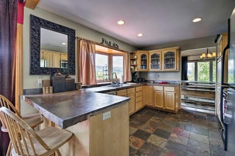 Kitchen with river and mountain views.