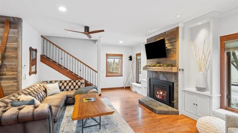 Enter through the doors of The Dancing Bears Den and be greated by a warm fire and a plush sofa to relax after a long day of adventures.