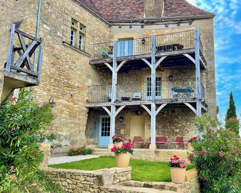 View of Maison Delluc with its double balconies offering stunning vistas 