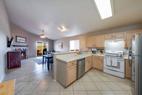 View of kitchen that flows into additional living room space