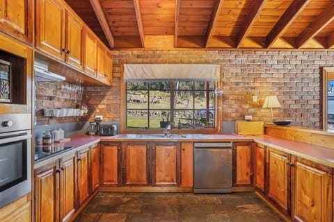 A full kitchen allows for easy at-home cooking, offering an oven and a dishwasher. 
