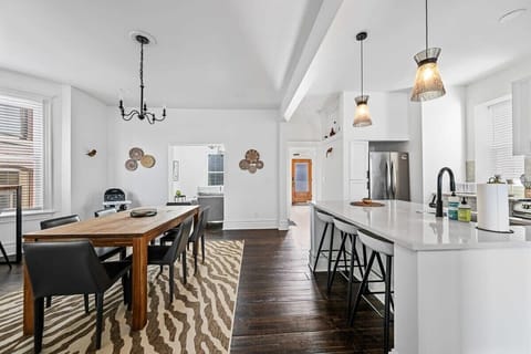 ️ Indulge in a feast for the senses! This stunning kitchen and dining room boasts a stylish table and elegant chairs, inviting you to savor every moment. #FeastForTheEyes #DiningInStyle #KitchenEnvy