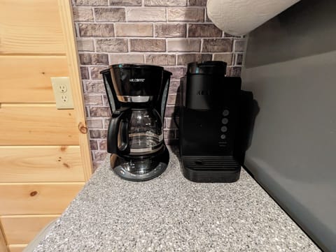 Keurig and drip coffee pot included along with a toaster and blender