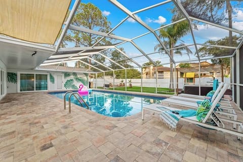 Poolside Paradise: Dive into fun under the sun with vibrant decor and refreshing ambiance!