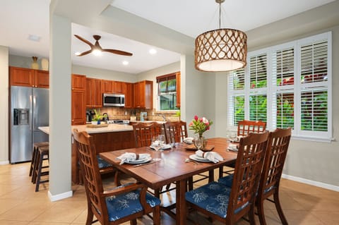 Dining area with table for six right off the kitchen means you can still visit with the chef.