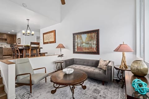 Living Room: Relax in style with artful decor and natural light filling this serene space!