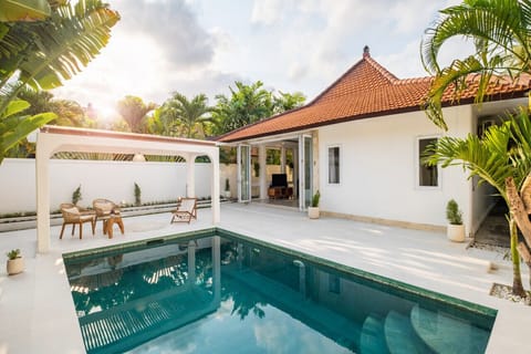 Relax and enjoy the sunset view from the swimming pool