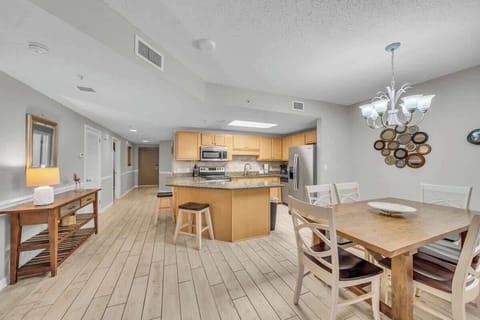 Living room opens up to kitchen and dining area