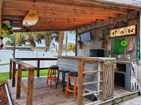 Enjoy watching the game in your own private Tiki Hut bar. 