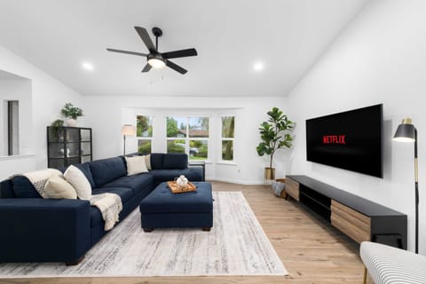 Catch up on your favorite series or enjoy a drink in this well-appointed living space.