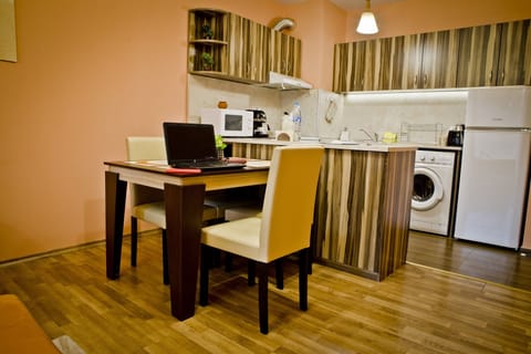 Dining table, refrigerator, washing machine, cooking stove, microwave oven