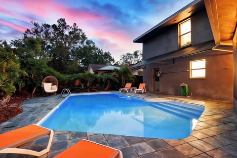 Large Heated Saltwater Pool w/ Night Lights & Deep End, Lounge Chairs & Tables.