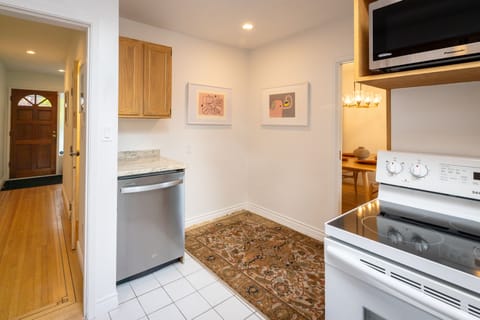 Functional book seating area in kitchen area (photo taken before chair placed)