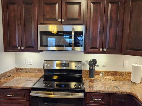 Kitchen with under cabinet lighting.