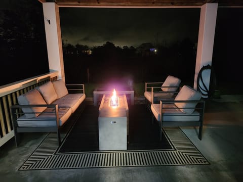 Enjoy the outdoor firepit while drilling dinner or watching tv.