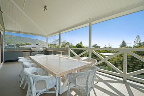 Enjoy the mountain views and the spacious surrounds of the upstairs alfresco featuring a table to seat 10 serviced by outdoor kitchen (four burner bbq, sink, bar fridge and additional crockery, cutlery and drinking glasses for your convenience).