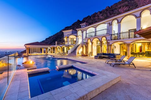 Large backyard & balcony w/ pool, spa, loungers, outdoor kitchen, & more