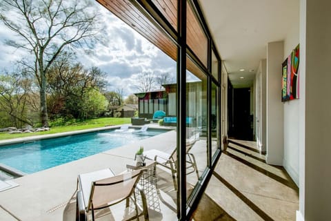 Large pool with plenty of loungers and outdoor seating. The pool can be heated upon request all year round for an additional charge.