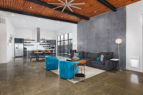 Open floor plan flows from the patio to the living / dining areas & spacious chef`s kitchen, with plenty of seating for large groups.