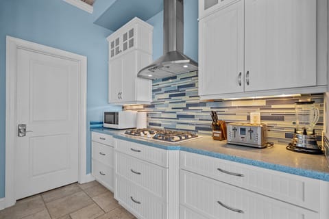 3rd floor kitchen offers gas range and plenty of countertop space