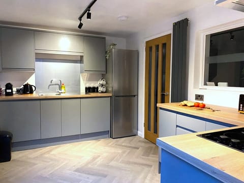 Kitchen: large fridge/freezer, coffee machine, kettle, dishwasher, washer/dryer.
