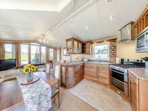Open plan living space | Hafod Caravan - Tyddyn Sargent, Tyn Y Gongl, near Benllech