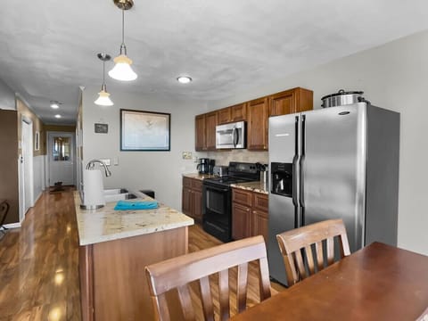 Fully equipped kitchen with stainless steel appliances