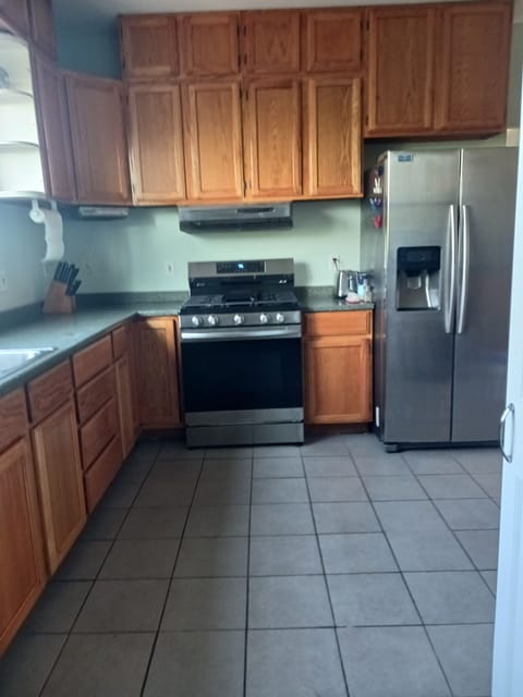 new stove and refinished cabinets