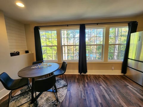 Dining table also doubles as an office work space.