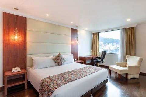 Wake up refreshed in a sleek room with skyline views.