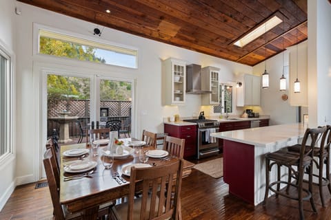 Seat 6 to 8 at the dining table with overflow at the kitchen bar.