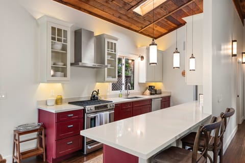 Substantial counters, recent stainless steel appliances, and propane range make this a generous kitchen!