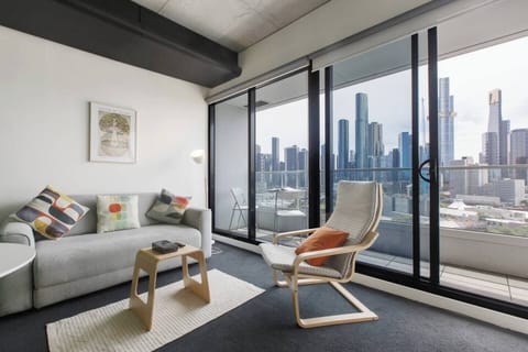 The living area effortlessly connects to the balcony, offering a perfect blend of indoor comfort and outdoor relaxation.