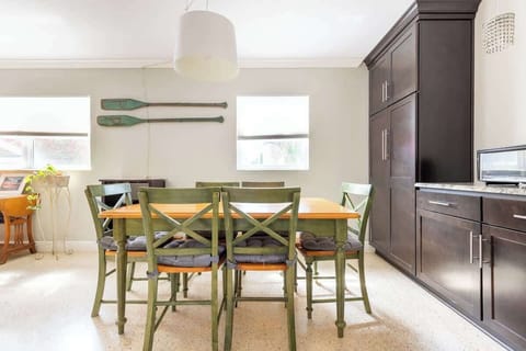 Dining room table just off from the kitchen area seats up to 6.