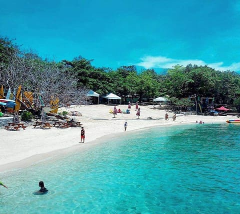 Mactan Newtown Beach 10 minutes walk.
