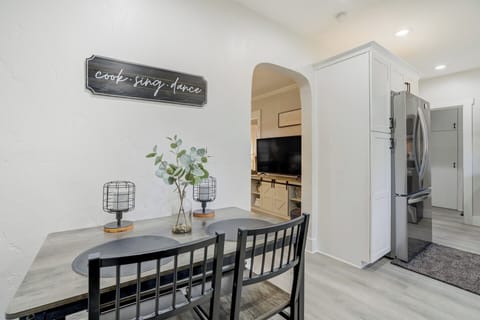 Dining table with 2 chairs and a bench seat under table