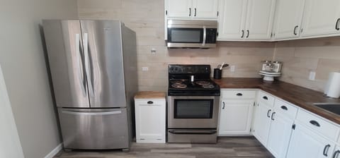 Full size fridge and oven and microwave