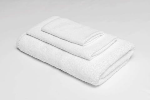 Wrap up in plush, fresh towels after a soothing shower.