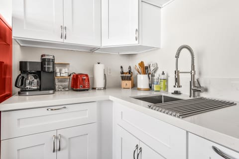 Keurig Coffee Machine. Compliantly coffee pods and sweetener.