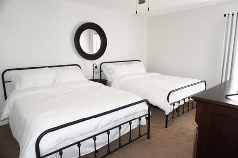 Bedroom 2- Two Queen Beds, 65” Smart TV, USB lamps