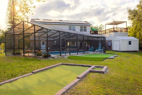 Shared putting green, bocce ball, fire pit, dock and pergola! Ultimate hang out spot.