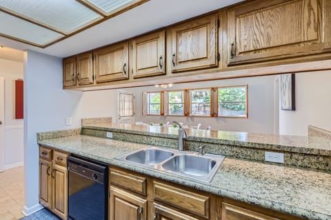 Maximize your culinary creativity with a half-wall counter offering ample space