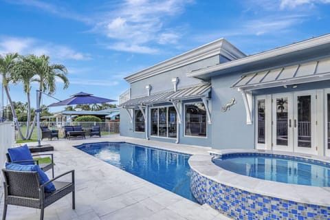 Escape the ordinary and find your happy place at this tropical paradise pool and spa.