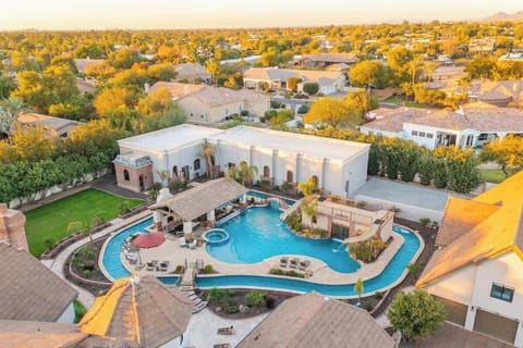 Stunning aerial shot highlighting waterslides, waterfall features, and 295 foot lazy river