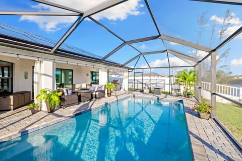 Heated Inground Pool With Pool Cage